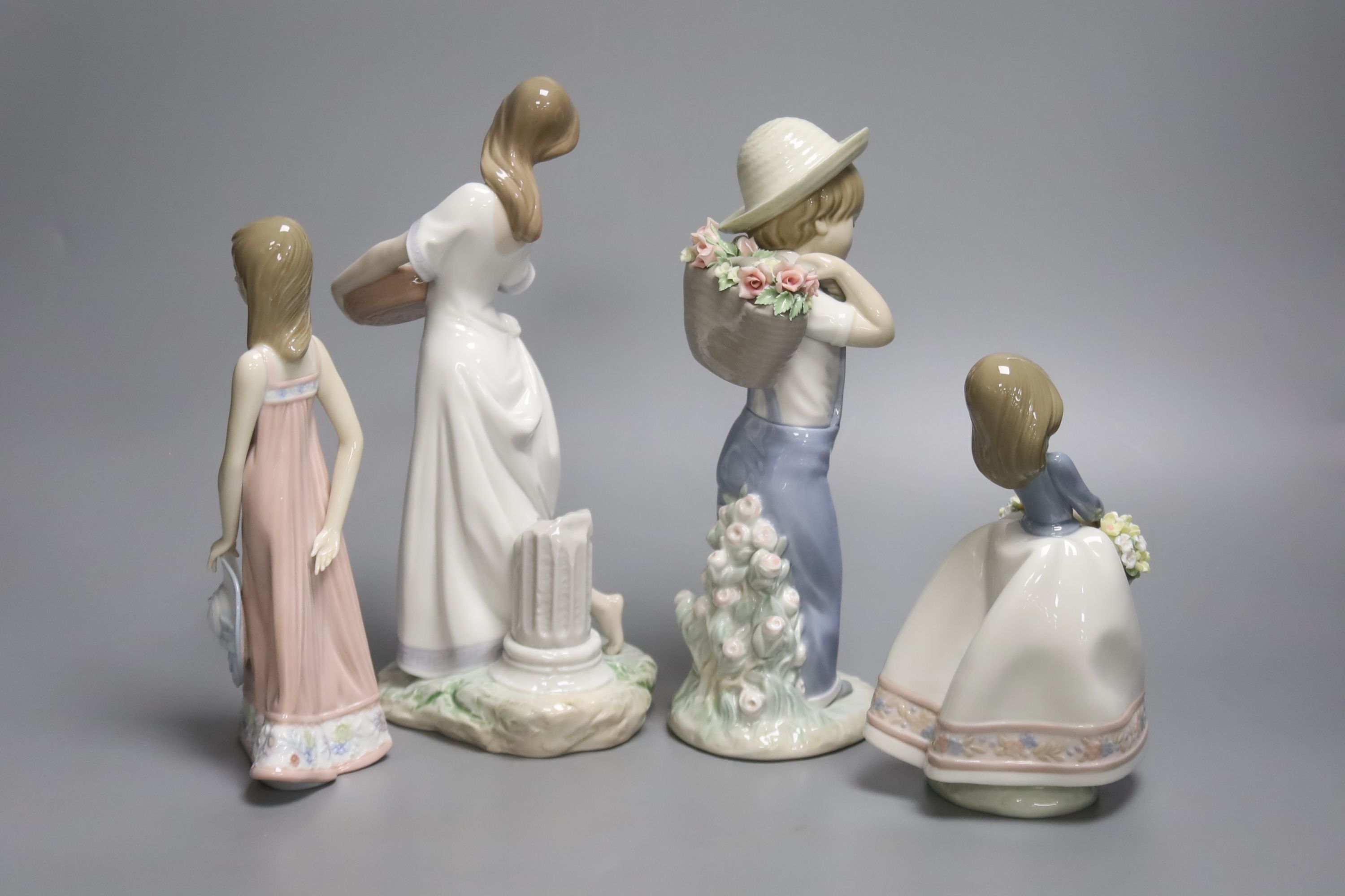 A Lladro figure of a boy 